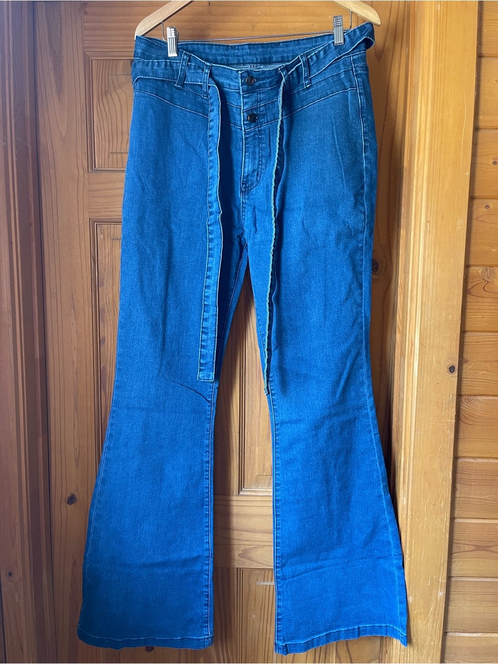 High-Rise Blue Flared Jeans with Self Tie Waist